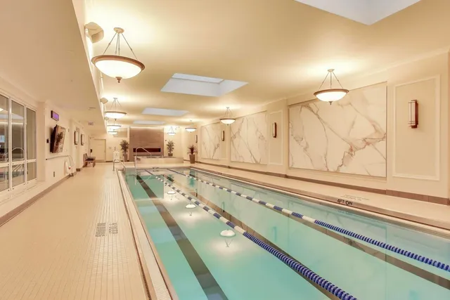 a view of a living room and bathroom