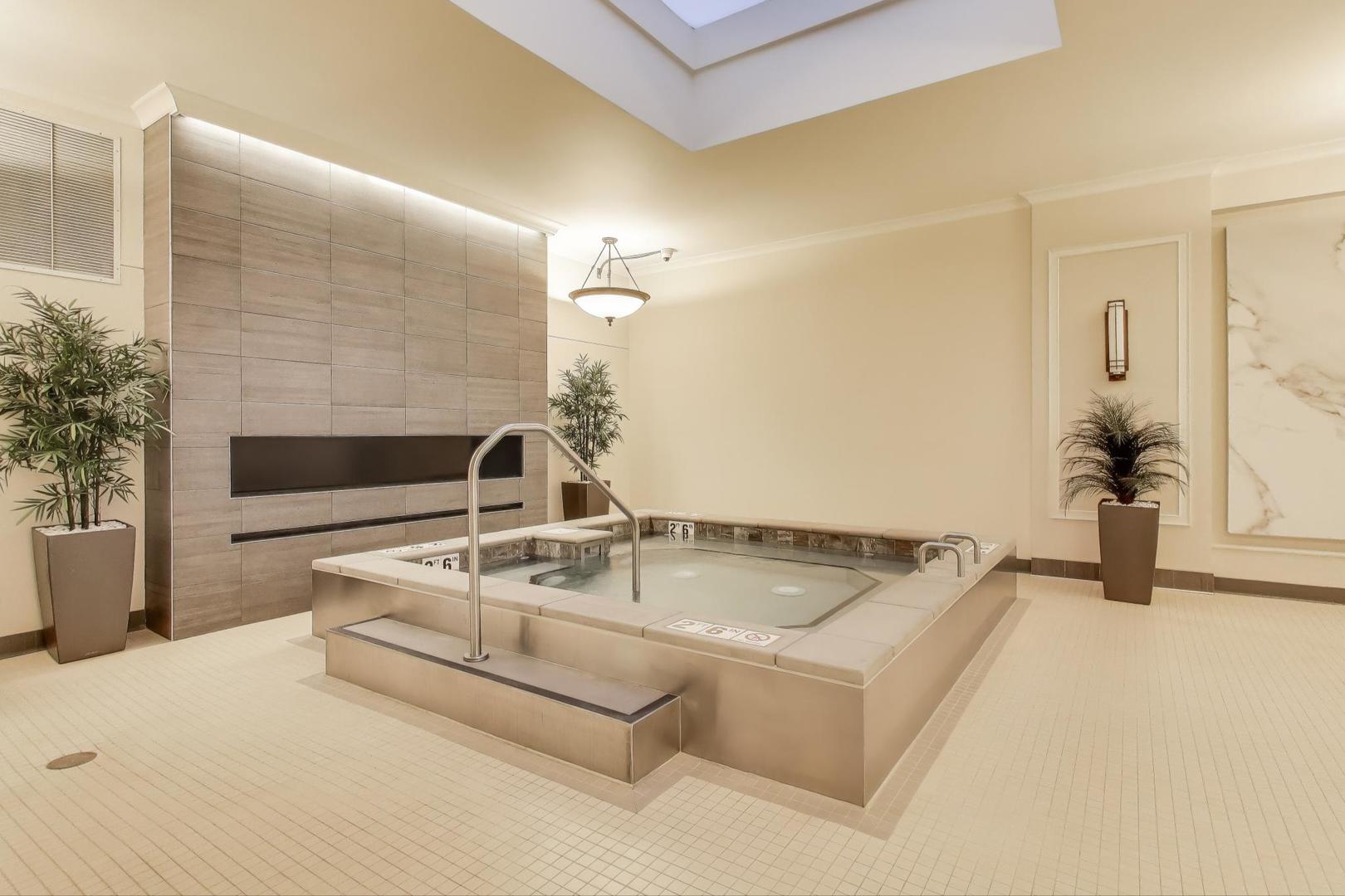 57 East Delaware Place, Unit 3504 Chicago, IL 60611 - Photo 40 of 45 a kitchen with granite countertop a sink and a stove