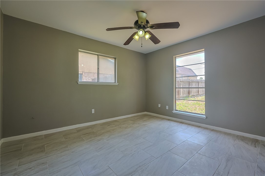 4314 Caplin Drive Corpus Christi, TX 78410 - Photo 15 of 25 a view of an empty room with a window