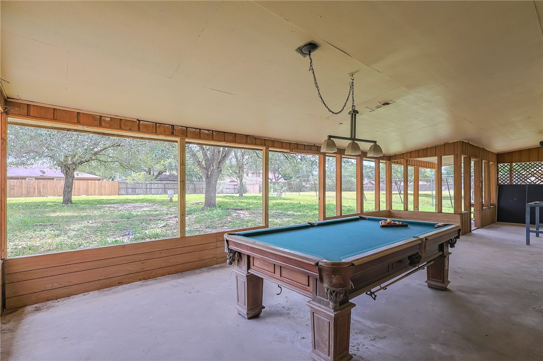4314 Caplin Drive Corpus Christi, TX 78410 - Photo 22 of 25 a room with pool table and windows