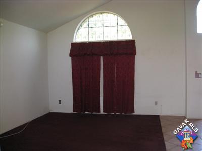 3201 Shale Road Palmdale, CA 93550 - Photo 4 of 7 an empty room with windows