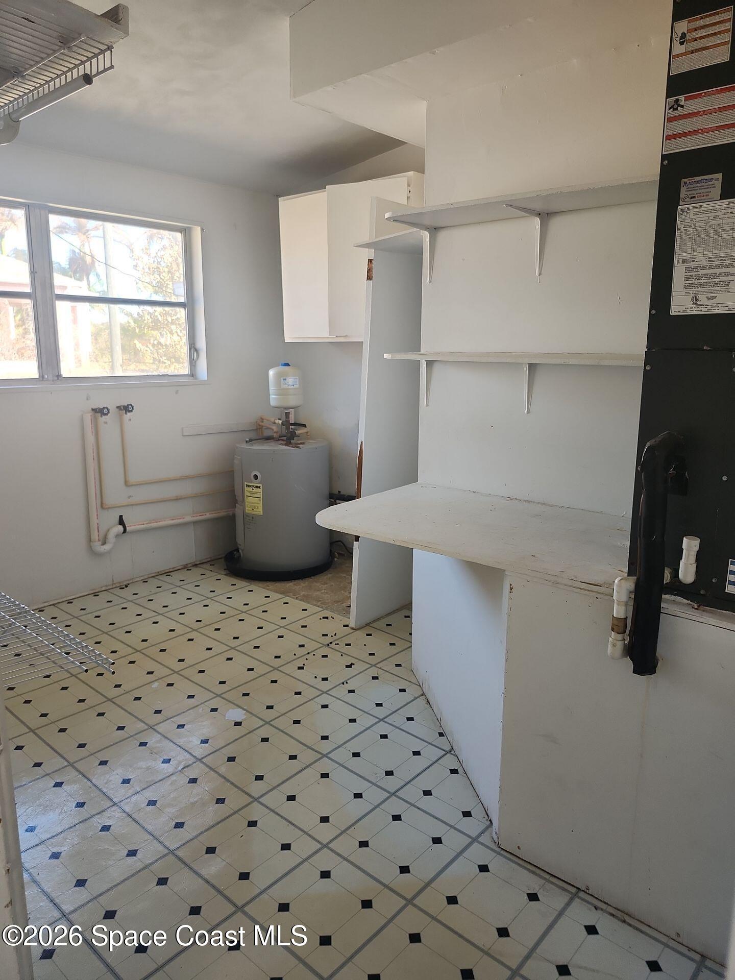 180 Church Road Merritt Island, FL 32953 - Photo 13 of 14 a bathroom with a sink toilet and shower