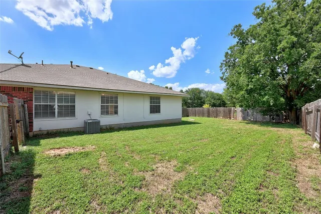 a view of a backyard with a garden