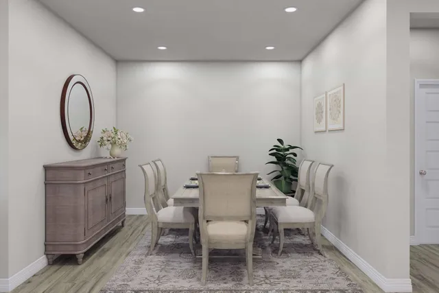 a view of a dining room with furniture