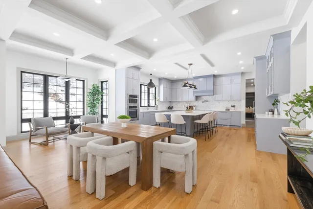 a large kitchen with lots of counter space and windows