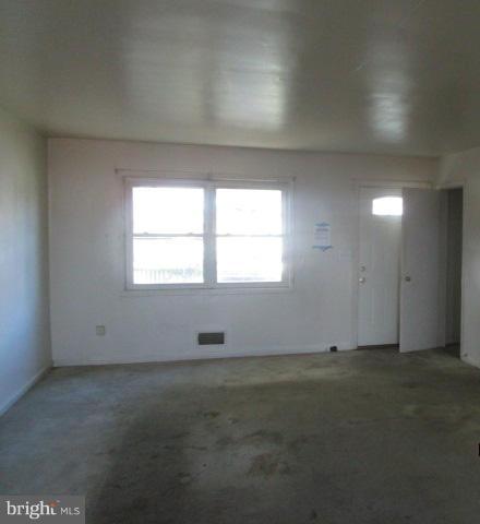 9737 Bird River Road Baltimore, MD 21220 - Photo 4 of 17 an empty room with a window