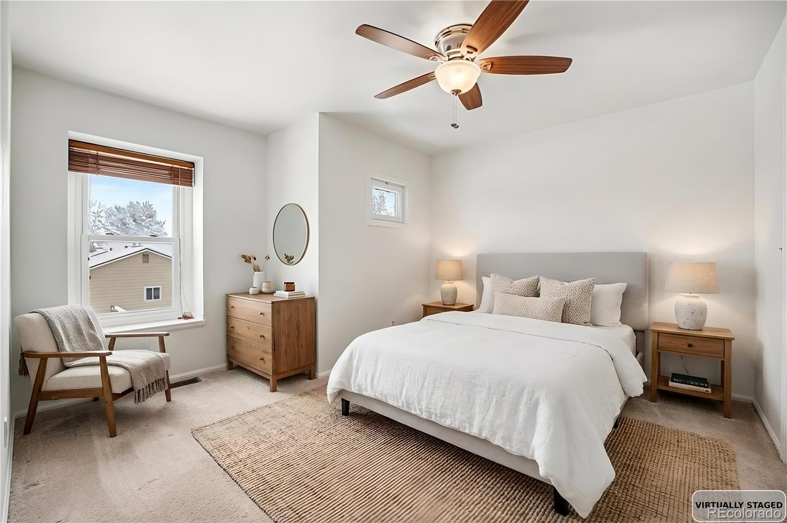 5257 Estes Circle Arvada, CO 80002 - Photo 16 of 22 a bedroom with a bed a desk and chair