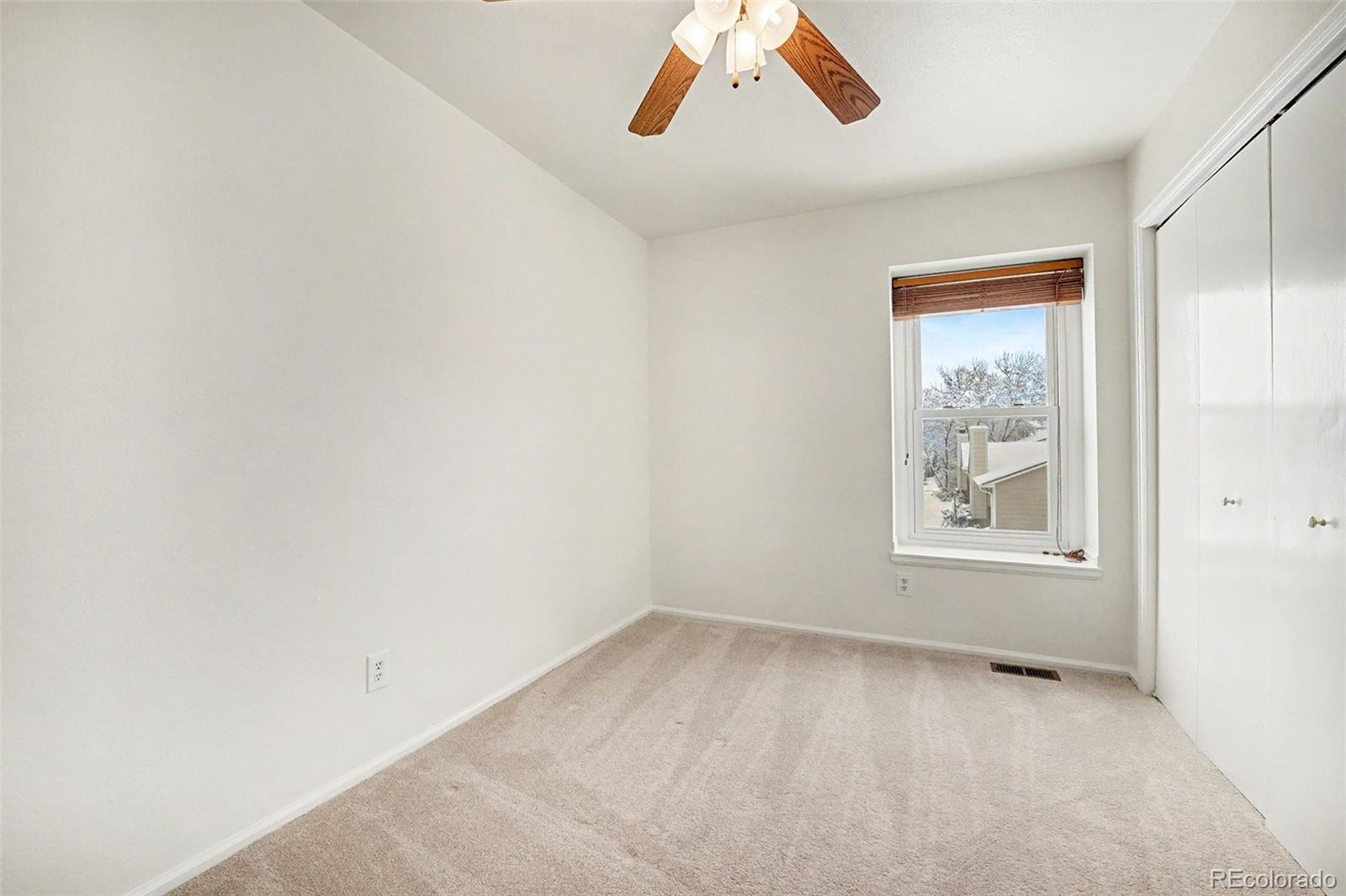 5257 Estes Circle Arvada, CO 80002 - Photo 17 of 22 an empty room with a window