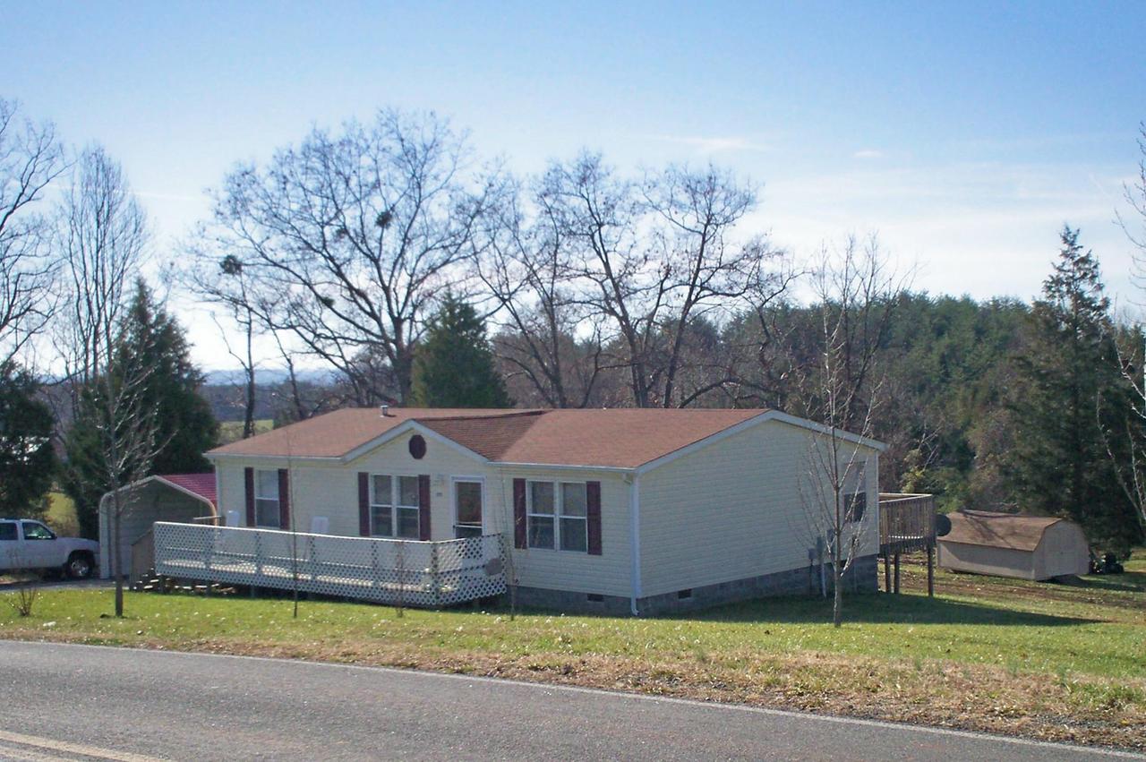 1775 Harmony School Road Hardy, VA 24101 - Photo 1 of 8 a view of a house with a yard