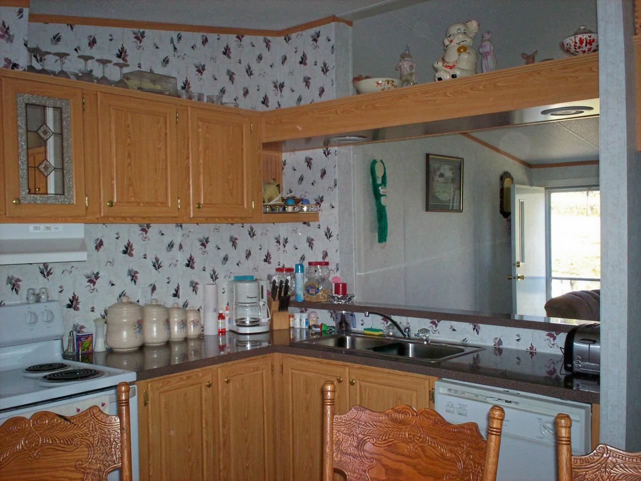 1775 Harmony School Road Hardy, VA 24101 - Photo 5 of 8 a kitchen with granite countertop a sink and a stove
