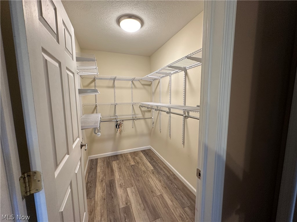 26296 Joe Day Road Quaker City, OH 43773 - Photo 22 of 34 master walk in closet