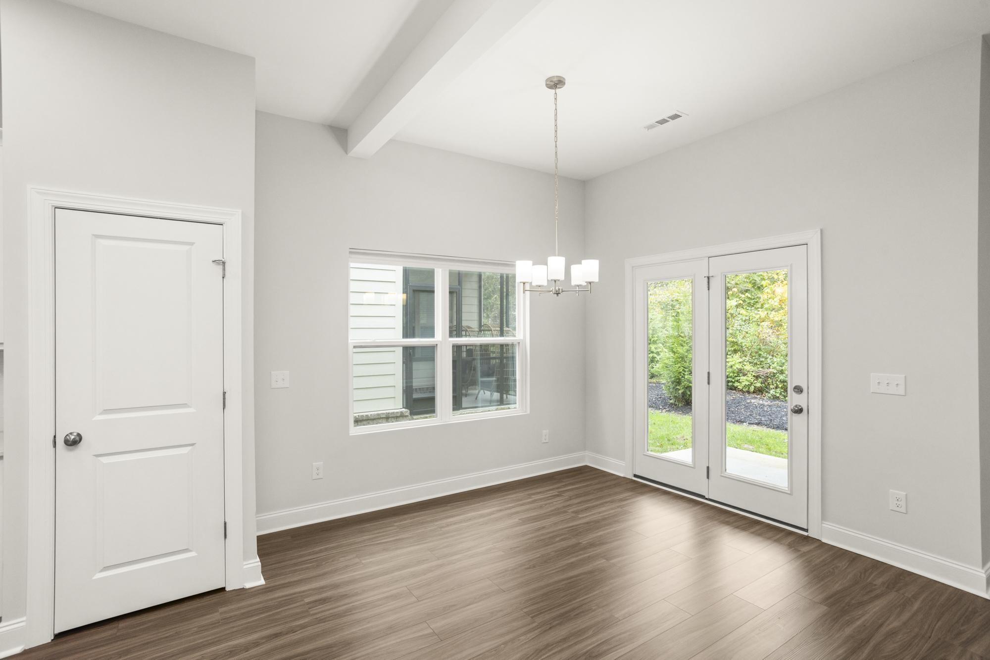 3706 Apies Street Murfreesboro, TN 37129 - Photo 12 of 42 a view of an empty room with wooden floor and a window