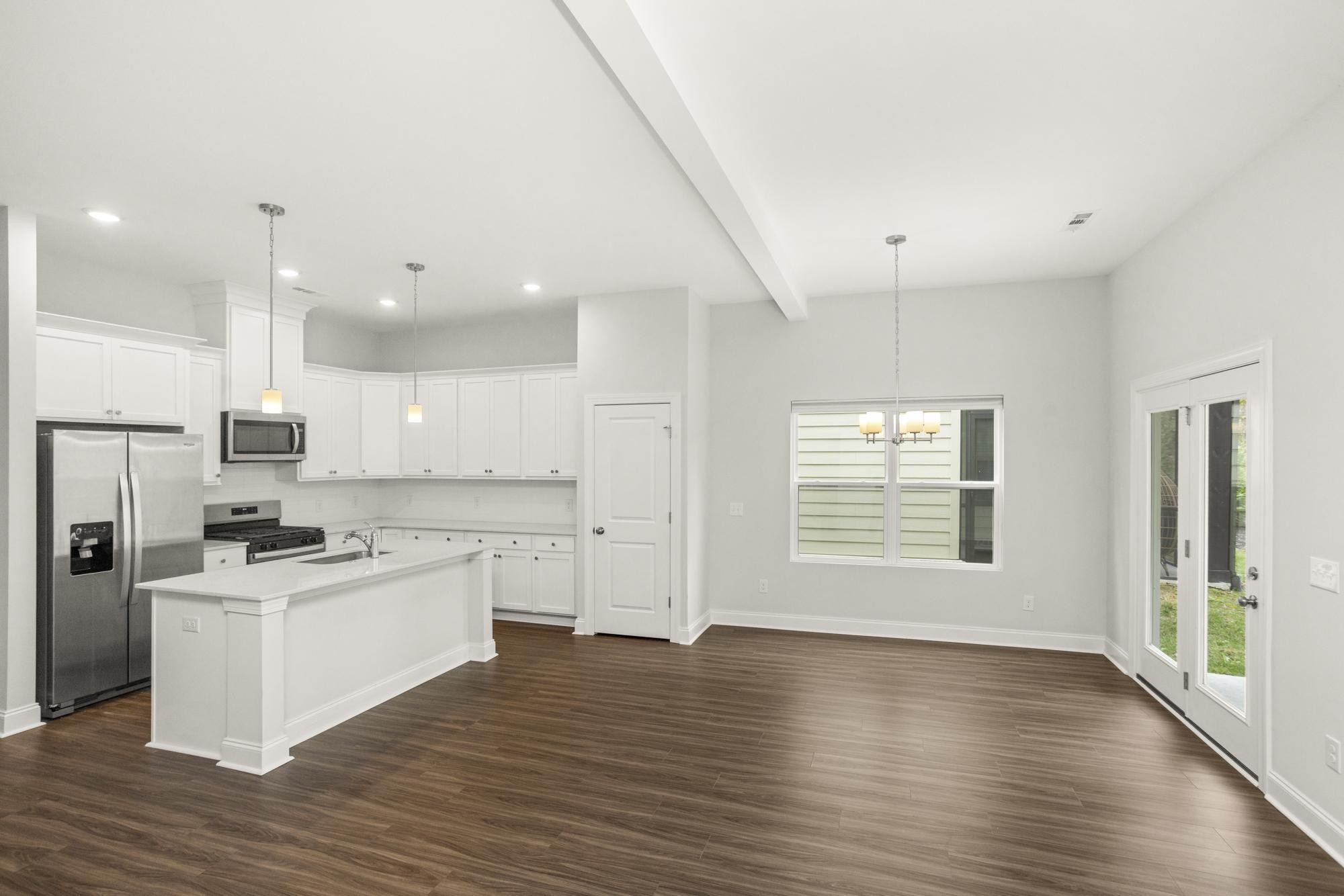 3706 Apies Street Murfreesboro, TN 37129 - Photo 14 of 42 a kitchen with stainless steel appliances a stove top oven a sink and a refrigerator