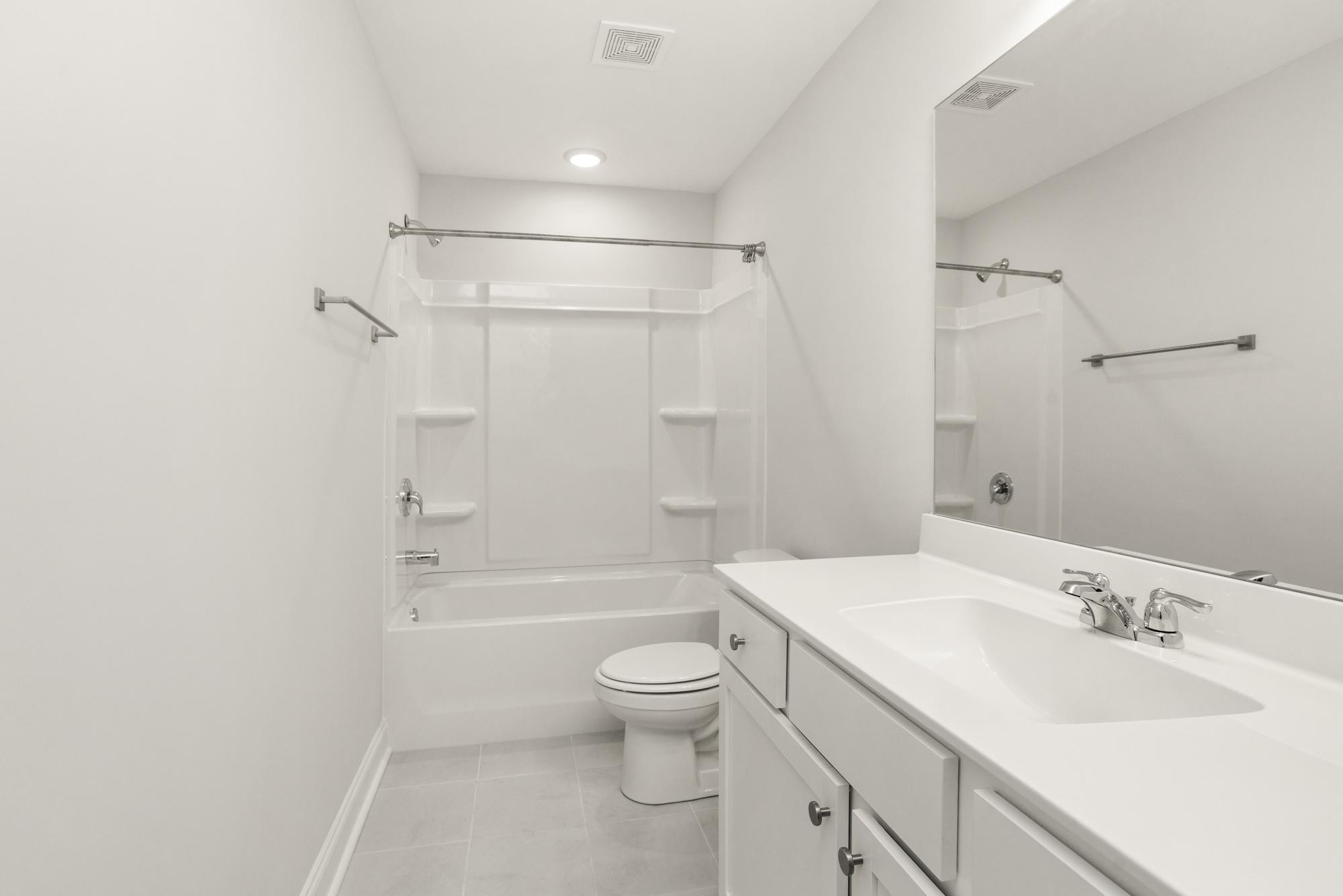 3706 Apies Street Murfreesboro, TN 37129 - Photo 35 of 42 a bathroom with a sink a toilet and shower