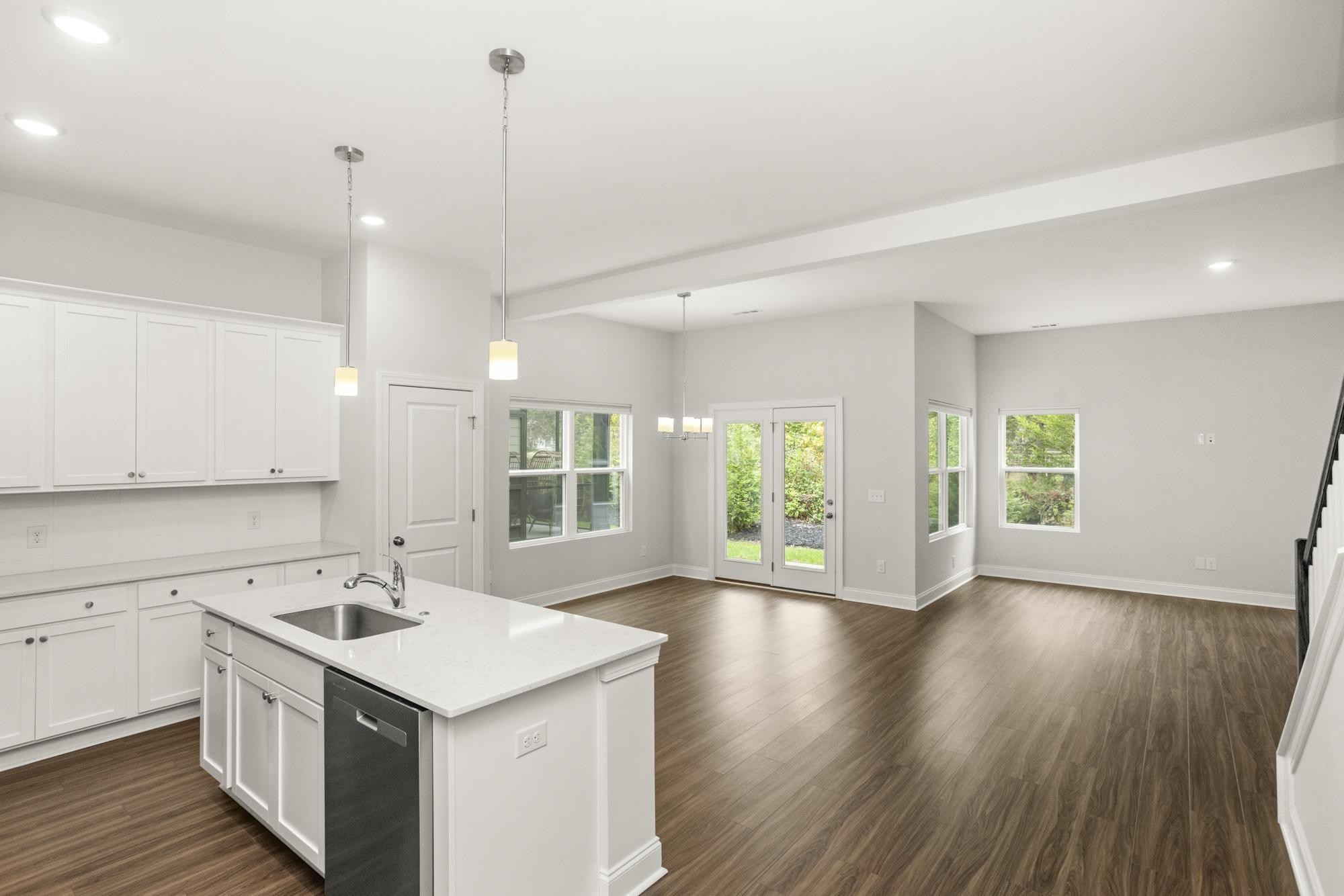 3706 Apies Street Murfreesboro, TN 37129 - Photo 10 of 42 a kitchen with a sink a window and wooden floor