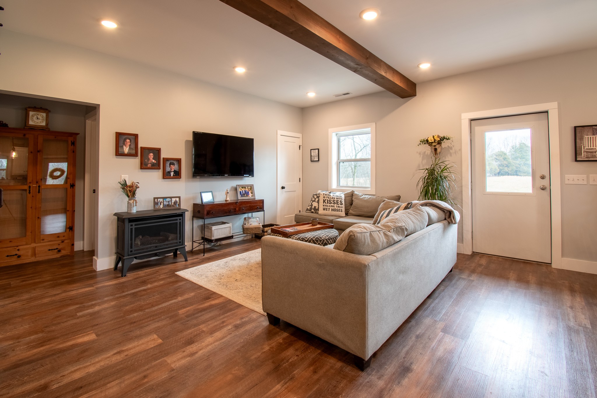 6490 Prospect Road Prospect, TN 38477 - Photo 21 of 52 a living room with furniture and a flat screen tv