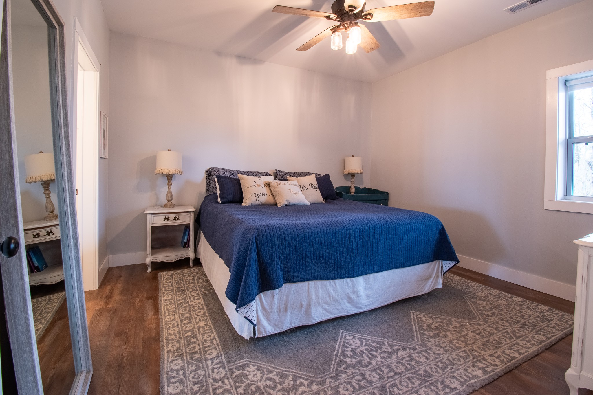 6490 Prospect Road Prospect, TN 38477 - Photo 27 of 52 a bedroom with a bed and a chandelier