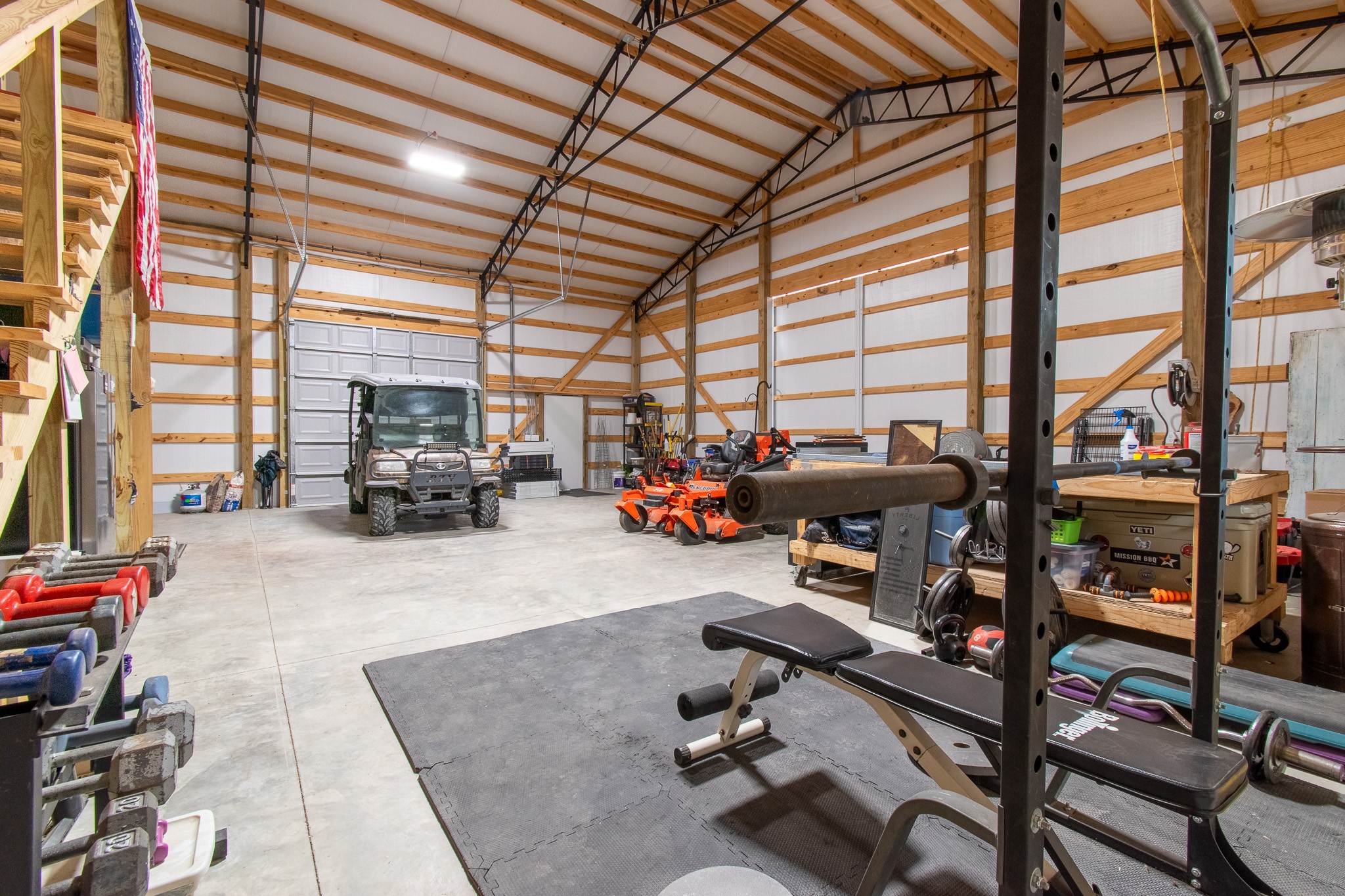 6490 Prospect Road Prospect, TN 38477 - Photo 28 of 52 a view of a room with gym equipment and a large window