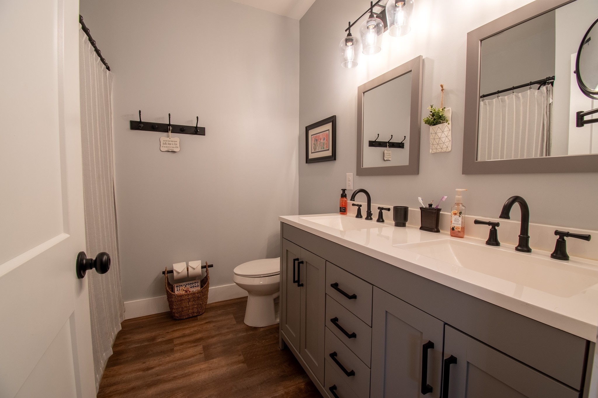 6490 Prospect Road Prospect, TN 38477 - Photo 35 of 52 a bathroom with a double vanity sink mirror and toilet