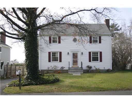 40 Ridgeley Street Darien, CT 06820 - Photo 1 of 15 a front view of a house with a yard