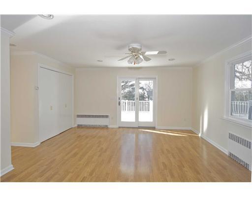 40 Ridgeley Street Darien, CT 06820 - Photo 5 of 15 a view of an empty room with a window