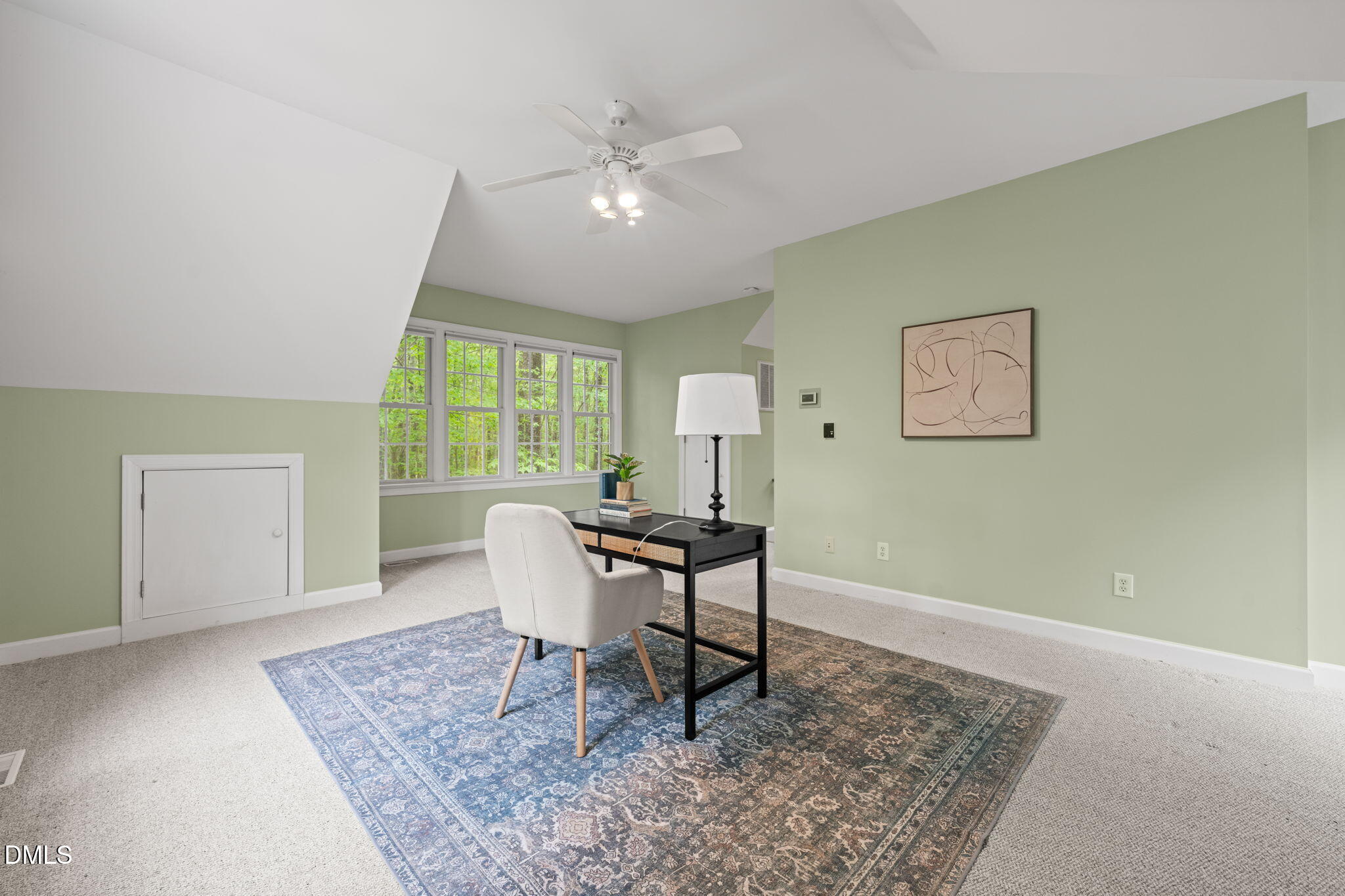 5809 Stone Spring Road Raleigh, NC 27613 - Photo 46 of 54 a workspace room with furniture and window