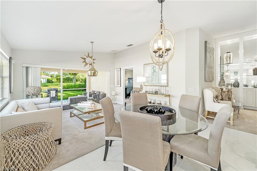 7767 Ionio Court Naples, FL 34114 - Photo 11 of 41 open den leads to master suite and screened lanai