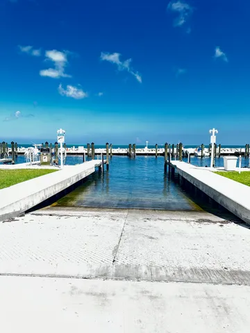 a view of swimming pool with a outdoor seating
