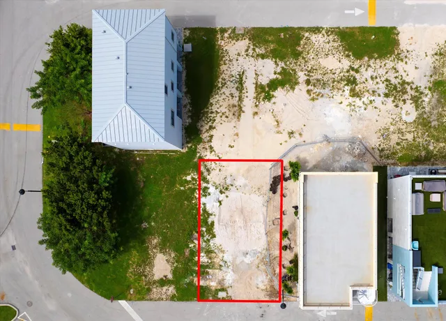 a view of a building with a yard