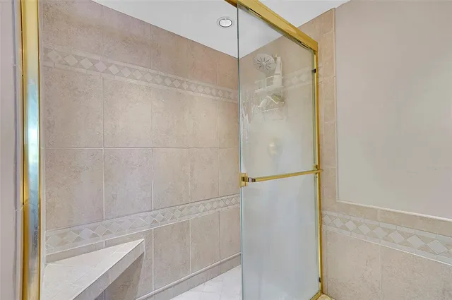 a view of a chair and table in the balcony