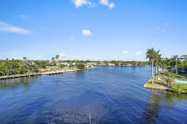 a view of a swimming pool with a lounge chairs