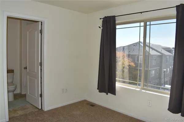 a view of a glass door and a window