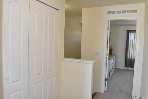 a view of hallway with sink