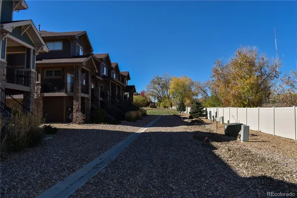 a view of a yard in front of a house