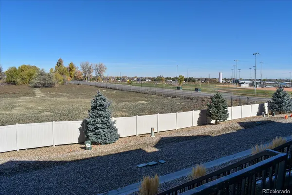 a view of a lake from a balcony