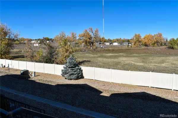 a view of a lake from a yard