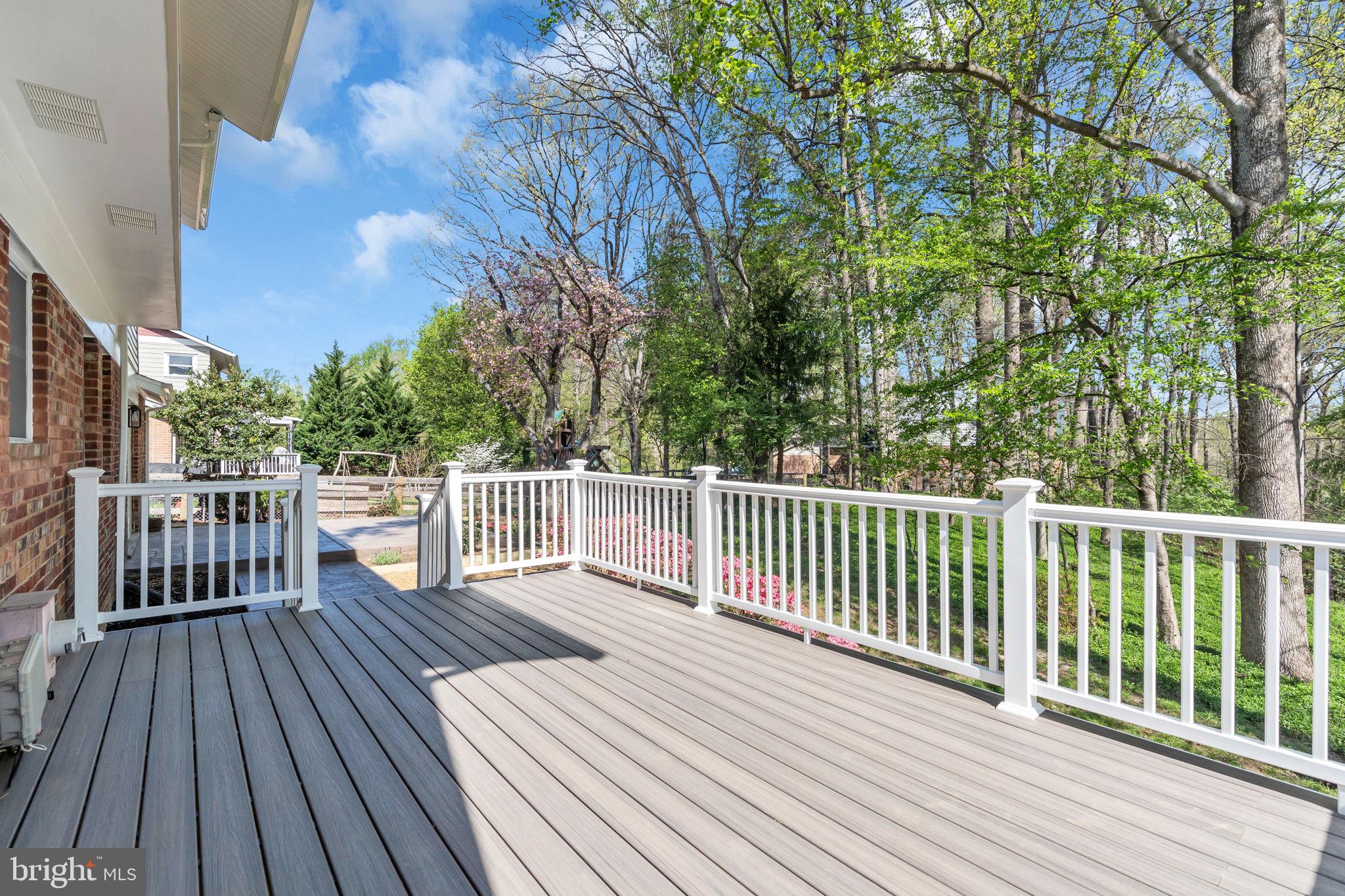 7804 Carrleigh Parkway Springfield, VA 22152 - Photo 26 of 61 a view of deck with wooden floor and fence
