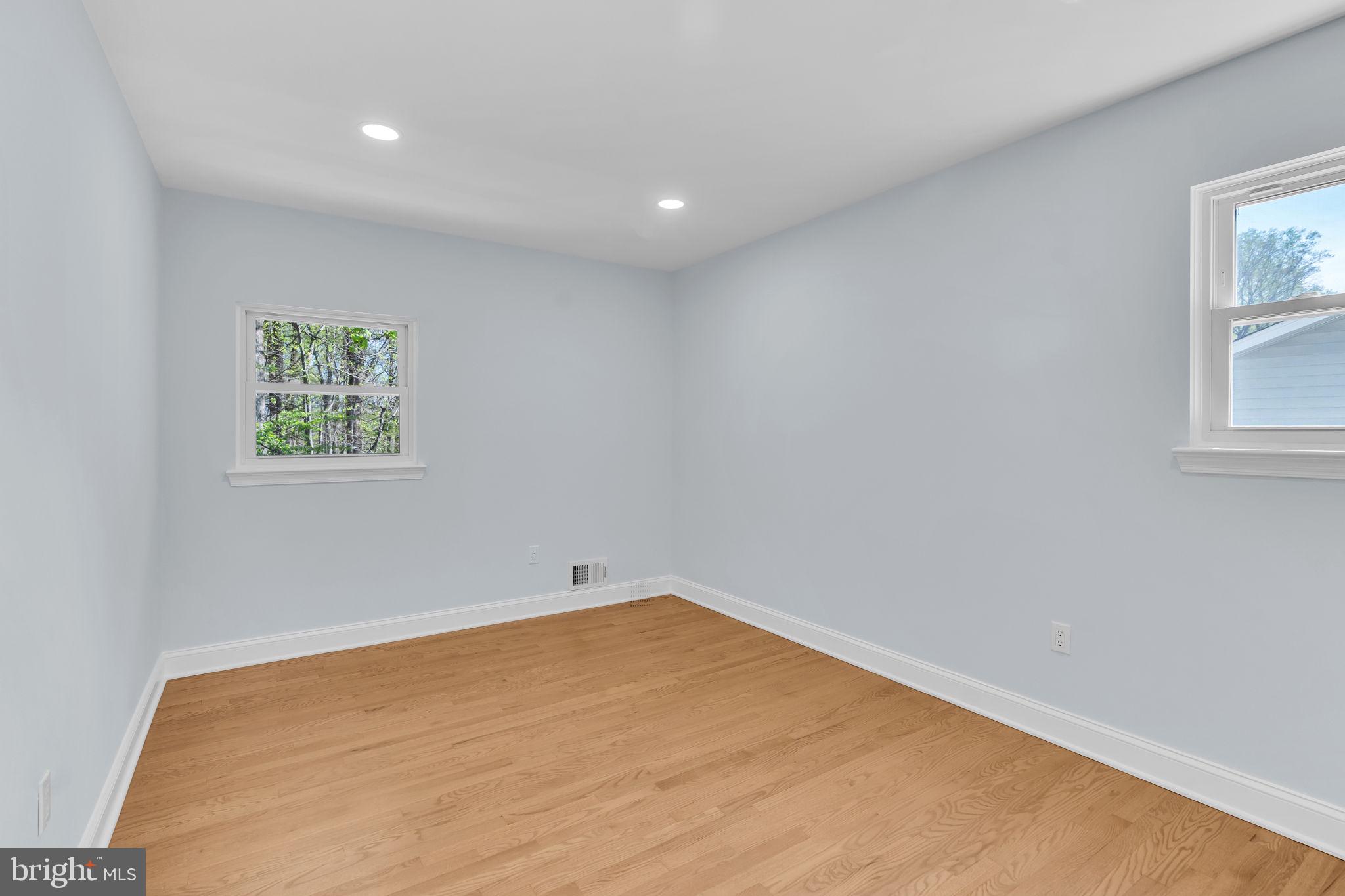 7804 Carrleigh Parkway Springfield, VA 22152 - Photo 41 of 61 an empty room with windows