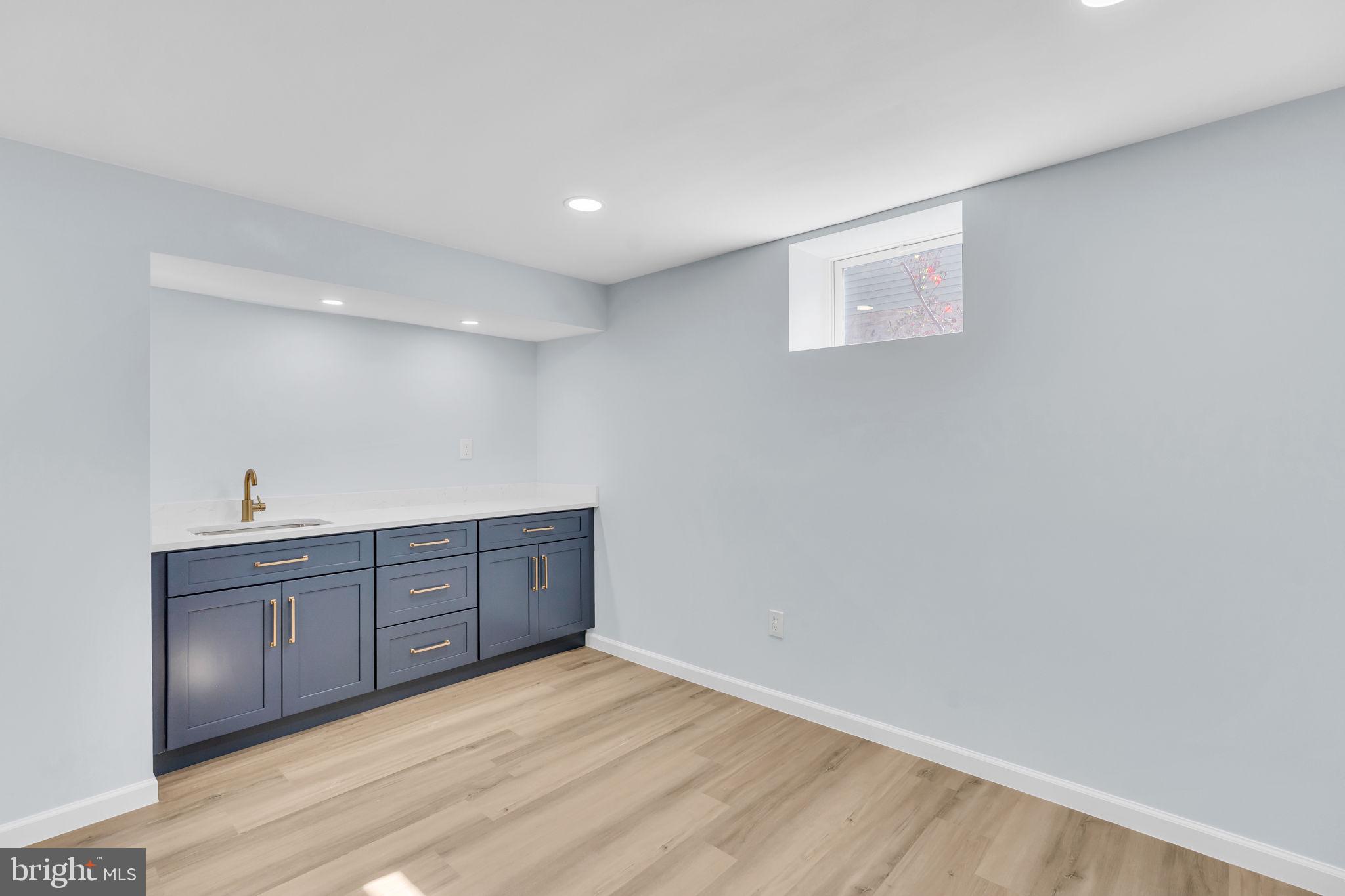 7804 Carrleigh Parkway Springfield, VA 22152 - Photo 48 of 61 a view of a kitchen with wooden floor