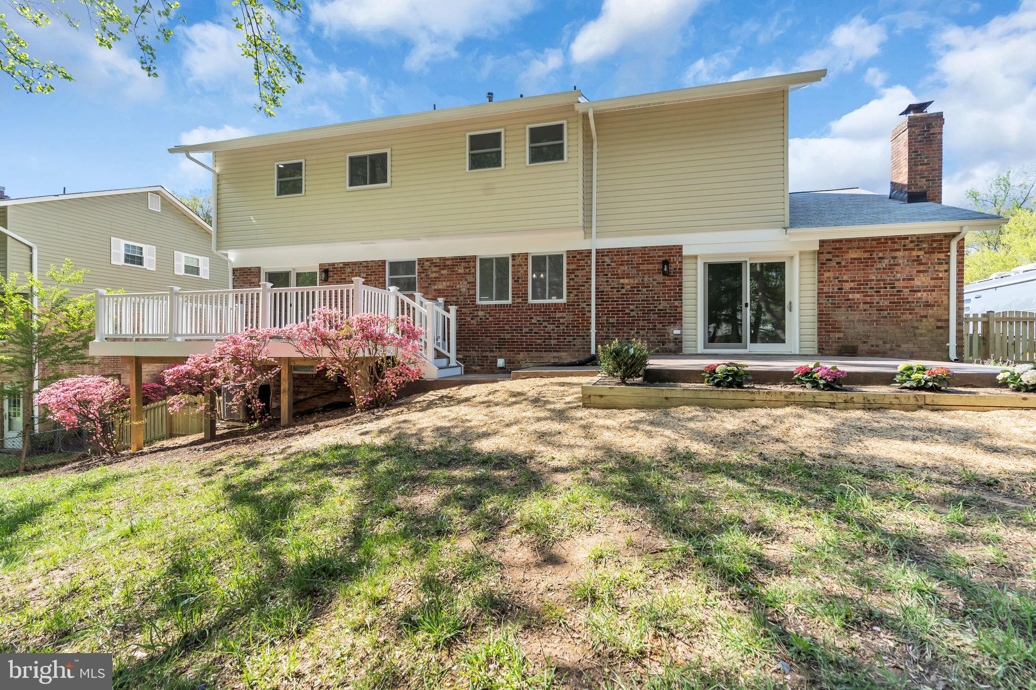 7804 Carrleigh Parkway Springfield, VA 22152 - Photo 54 of 61 a front view of multiple house with yard