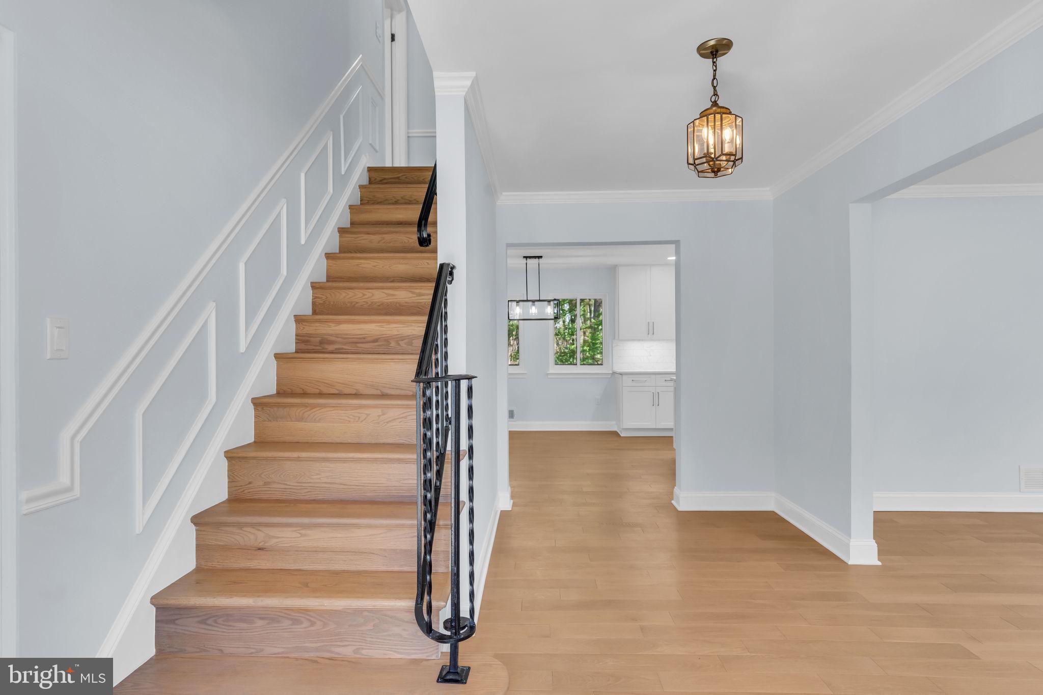 7804 Carrleigh Parkway Springfield, VA 22152 - Photo 6 of 61 a view of entryway and hall with wooden floor