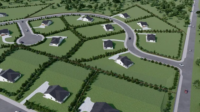 an aerial view of a house a yard and outdoor seating