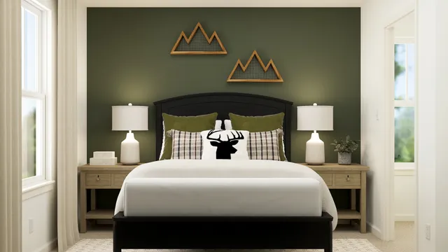 a bedroom with a bed and painting on the wall