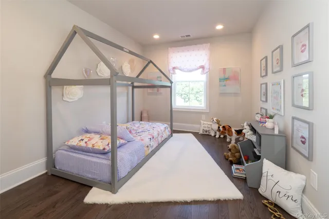 an aerial view of a house with yard and outdoor seating