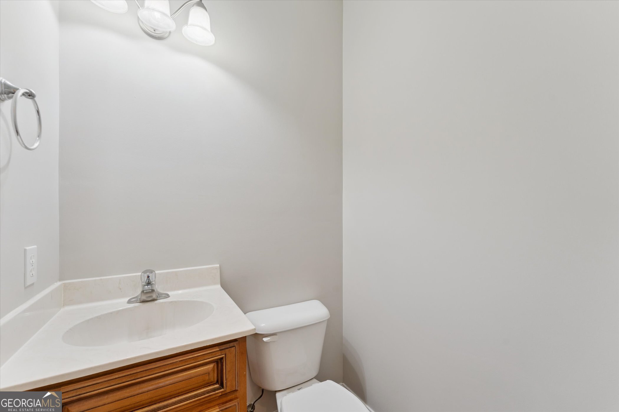 45 Veranda Trail Midway, GA 31320 - Photo 23 of 32 a white toilet sitting next to a white sink