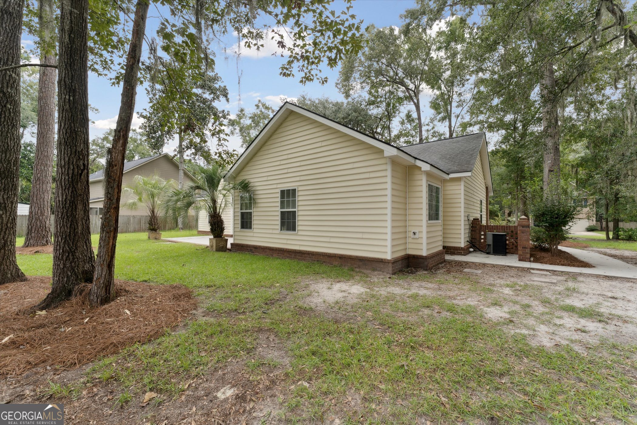 45 Veranda Trail Midway, GA 31320 - Photo 30 of 32 a view of a house with a yard
