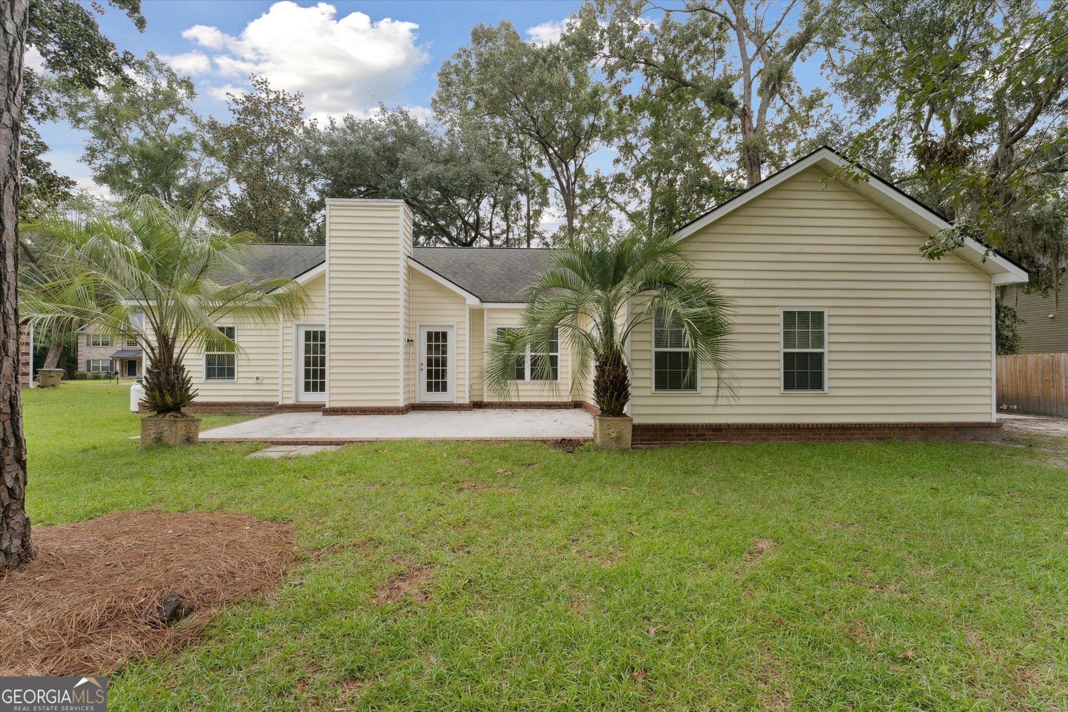 45 Veranda Trail Midway, GA 31320 - Photo 32 of 32 a view of a house with a backyard