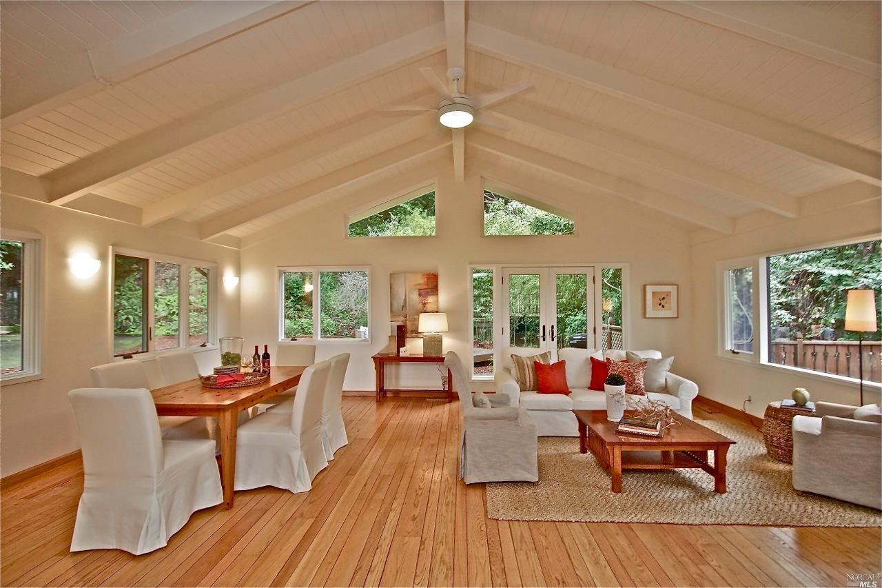 118 Briar Road Kentfield, CA 94904 - Photo 1 of 1 a living room with furniture and a large window