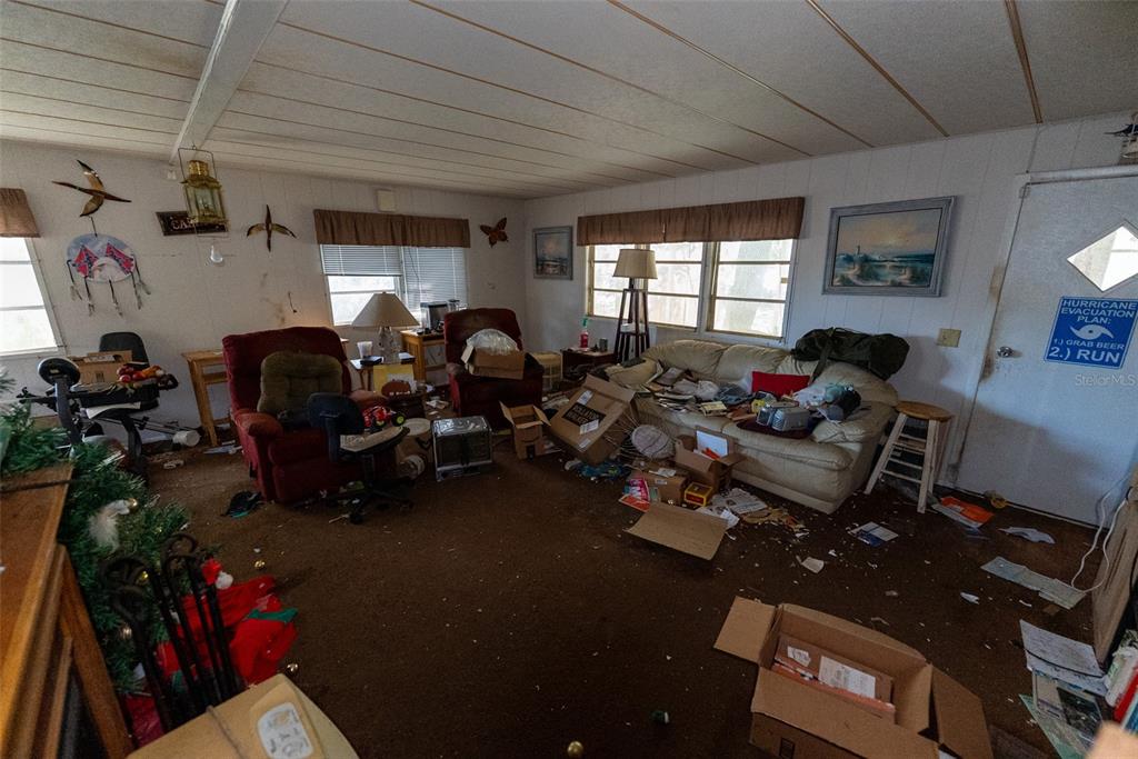 24971 Northeast 135th Street Salt Springs, FL 32134 - Photo 36 of 49 a living room with furniture