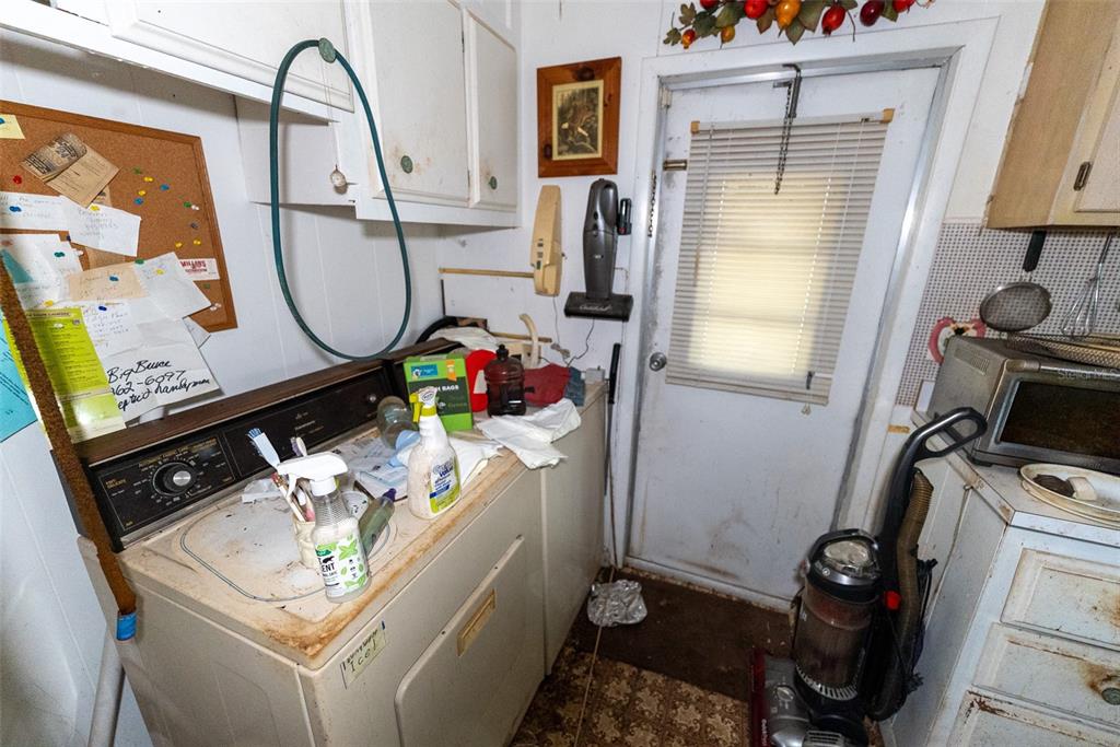 24971 Northeast 135th Street Salt Springs, FL 32134 - Photo 37 of 49 a bathroom with a sink mirror and vanity